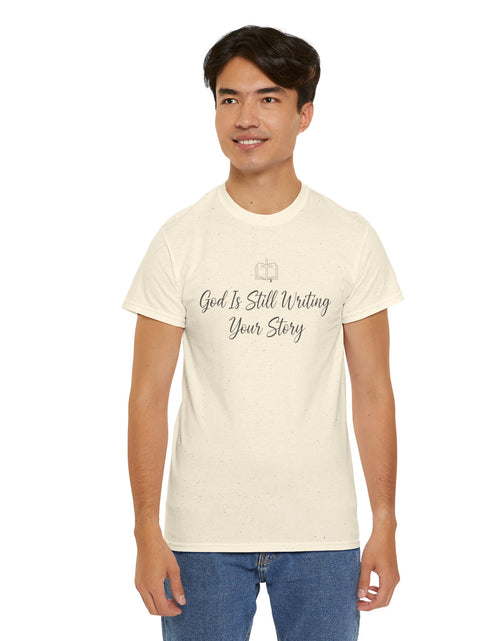 Load image into Gallery viewer, God Is Still Writing Your Story Tee — Inspirational Christian Faith Men's &amp; Women's T-Shirt
