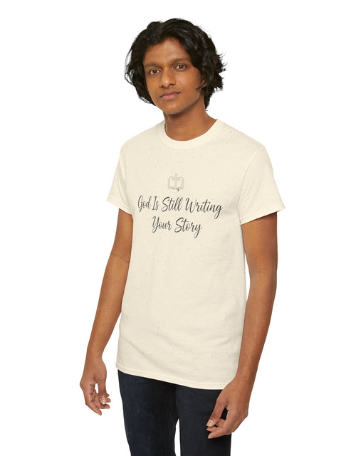 Load image into Gallery viewer, God Is Still Writing Your Story Tee — Inspirational Christian Faith Men's &amp; Women's T-Shirt

