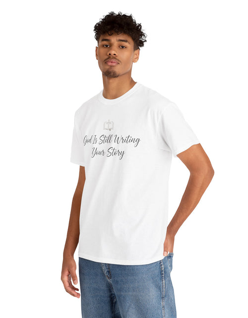 Load image into Gallery viewer, God Is Still Writing Your Story Tee — Inspirational Christian Faith Men's &amp; Women's T-Shirt

