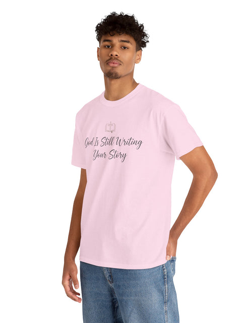 Load image into Gallery viewer, God Is Still Writing Your Story Tee — Inspirational Christian Faith Men's &amp; Women's T-Shirt
