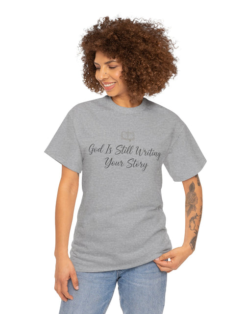 Load image into Gallery viewer, God Is Still Writing Your Story Tee — Inspirational Christian Faith Men's &amp; Women's T-Shirt
