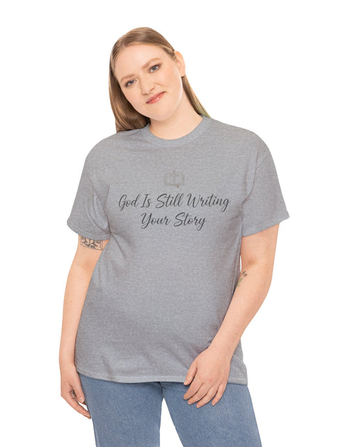 Load image into Gallery viewer, God Is Still Writing Your Story Tee — Inspirational Christian Faith Men's &amp; Women's T-Shirt
