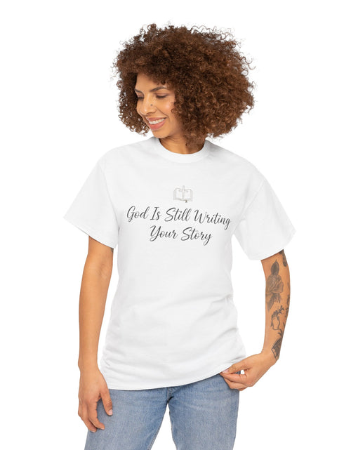 Load image into Gallery viewer, God Is Still Writing Your Story Tee — Inspirational Christian Faith Men's &amp; Women's T-Shirt
