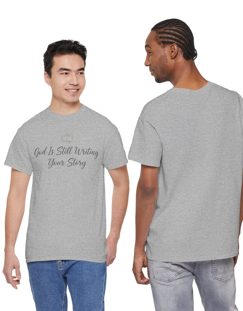Load image into Gallery viewer, God Is Still Writing Your Story Tee — Inspirational Christian Faith Men's &amp; Women's T-Shirt

